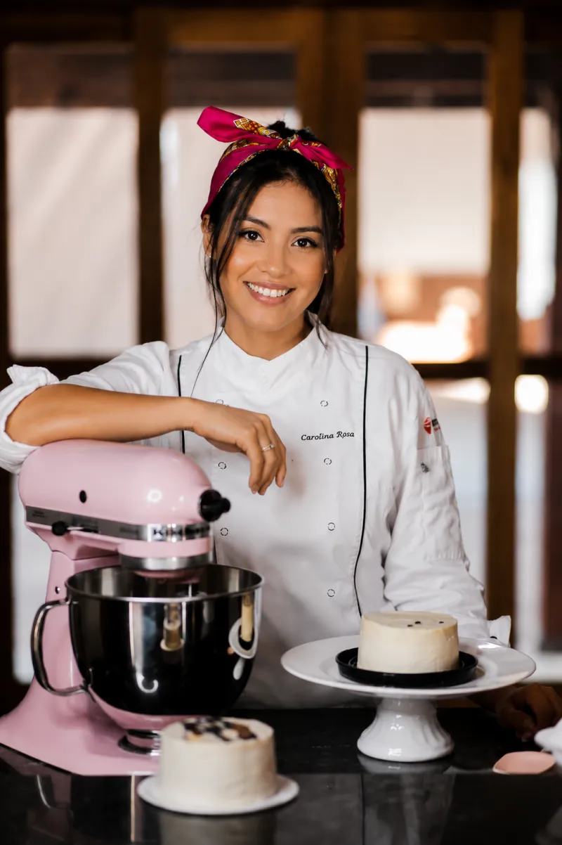 Taasty Cakes baker beside a pink stand mixer